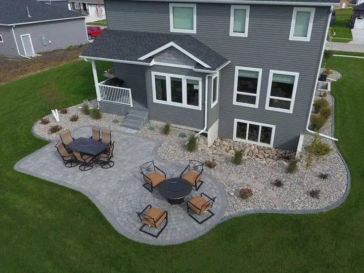 Aerial view of a finished paver patio with a fire table in Cleveland, Tennessee