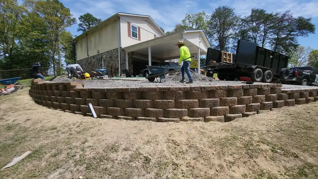Curved segmental block retaining wall behind a building near Cleveland, Tennessee