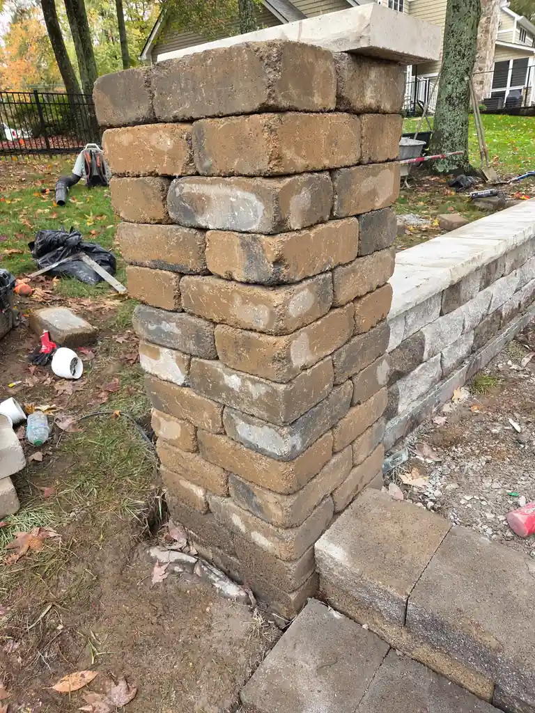 Stone column and block wall under construction in Cleveland, Tennessee